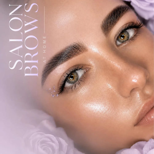 Close-up beauty image showing groomed laminated brows and lifted lashes with a salon brow at home message.