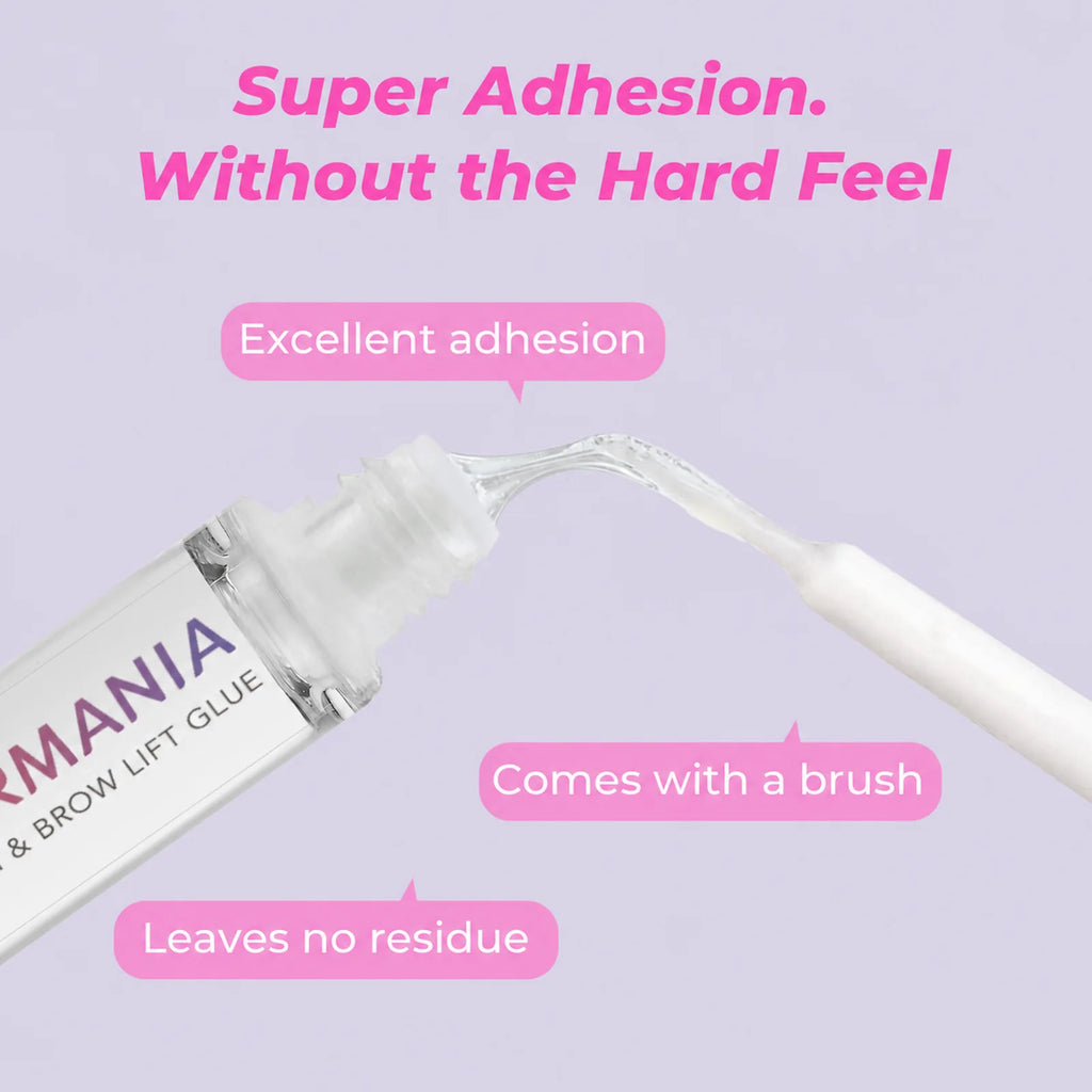 Close-up of clear PERMANIA lash lift adhesive on the applicator brush with notes about adhesion and residue.